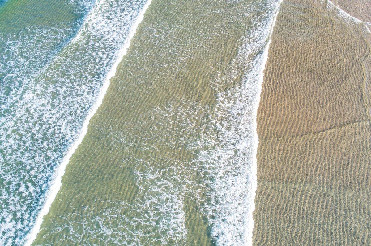 Carte des horaires de marée avec coefficients, essentielle pour optimiser la pêche en mer.