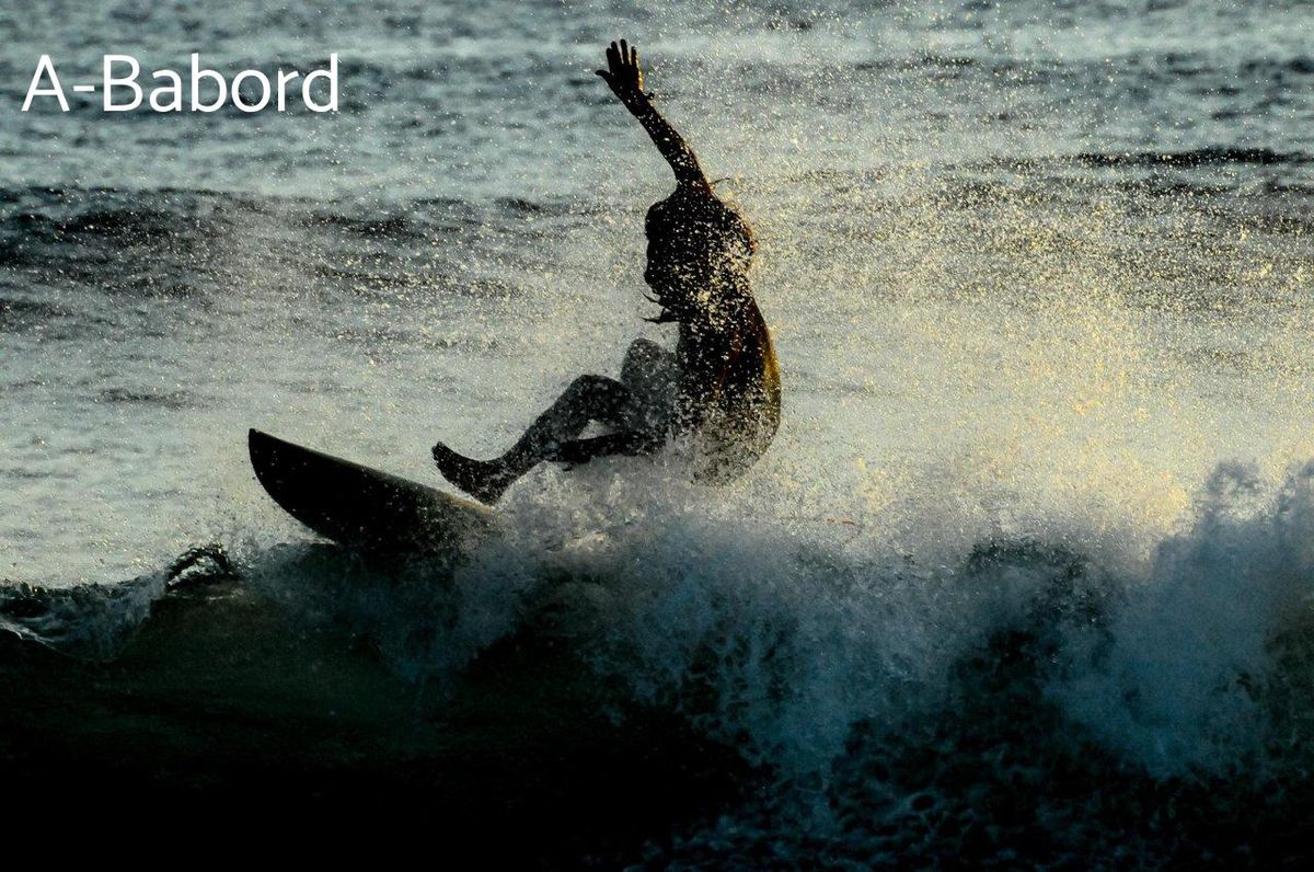 Surfeur en action : l'essence des défis olympiques contemporains. 🌊🏄‍♂️